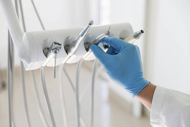 Professional Tooth Extraction technician working in Harrisburg, AR